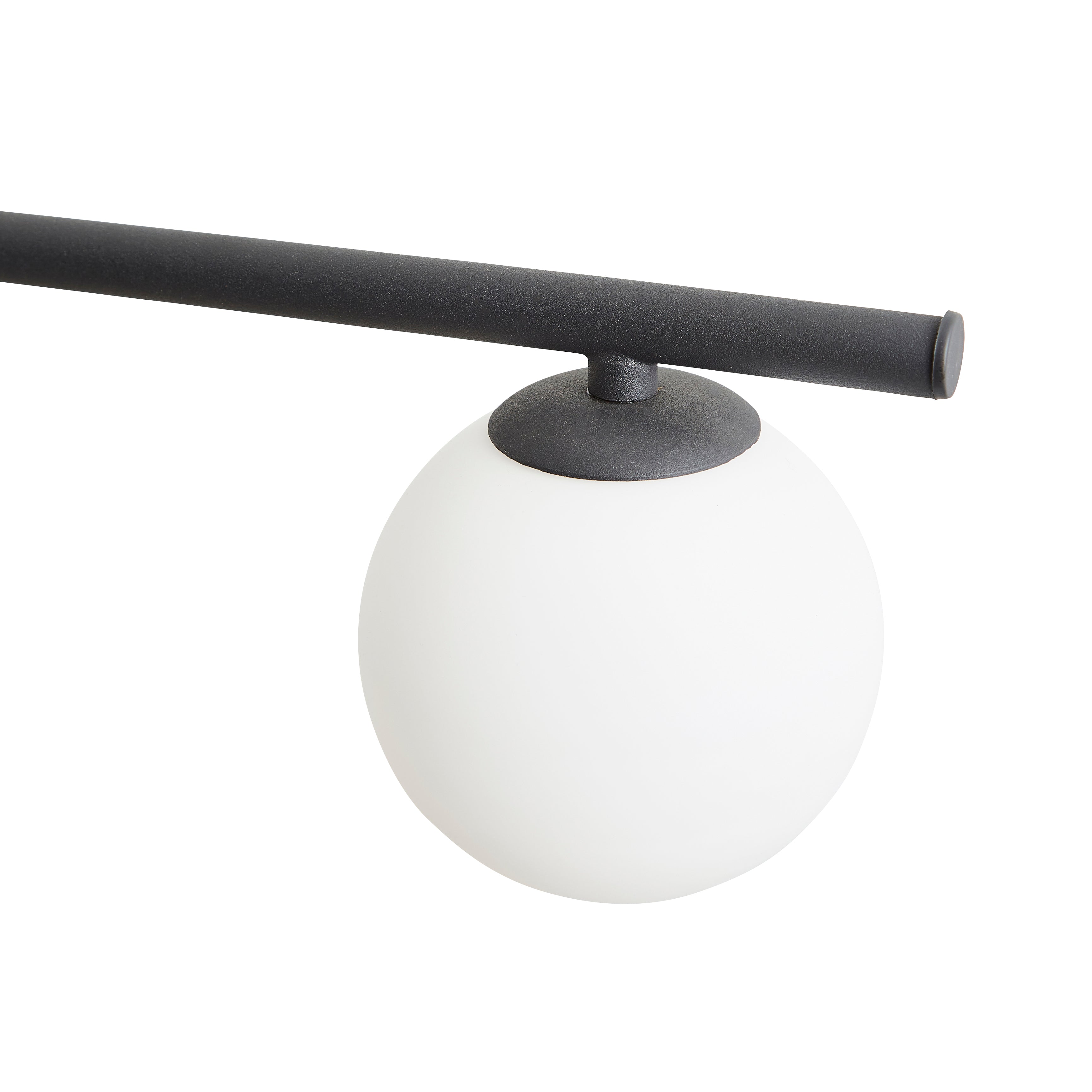 Modern ceiling light fixture with black rod and white globe on a white background