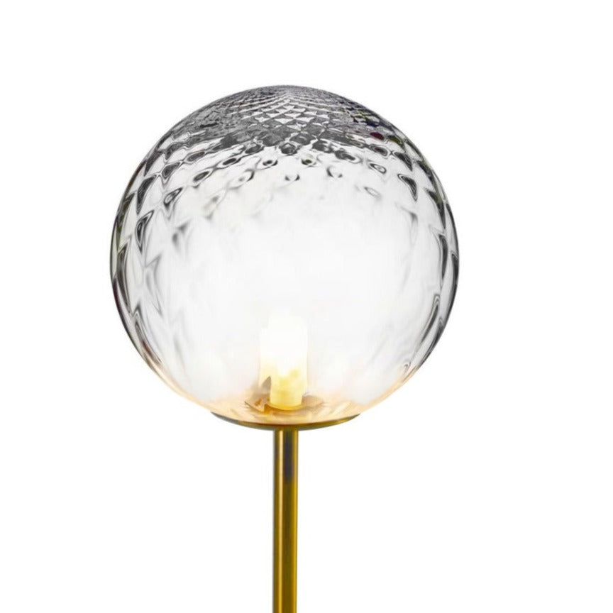 Introducing our Dixon table lamp with its elegant crystal and golden finish it will be sure to make a stylish addition to any living space. It features an ornate cut glass crystal globe design and is complimented by a brushed gold base that gives the light an undeniably luxurious style.
