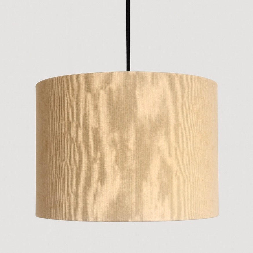 Beige lampshade on a plain background