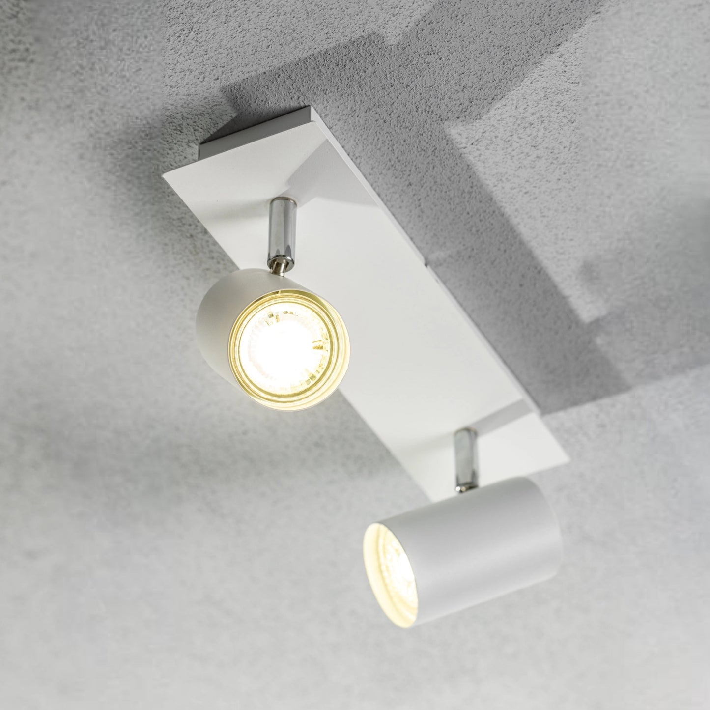 Add an industrial style to your home with the VENETO spotlight light finished in white. The lamp is also ideal for task lighting due to the adjustable heads providing a focused beam. The simplistic design of this light fitting makes it suitable for all interior styles.