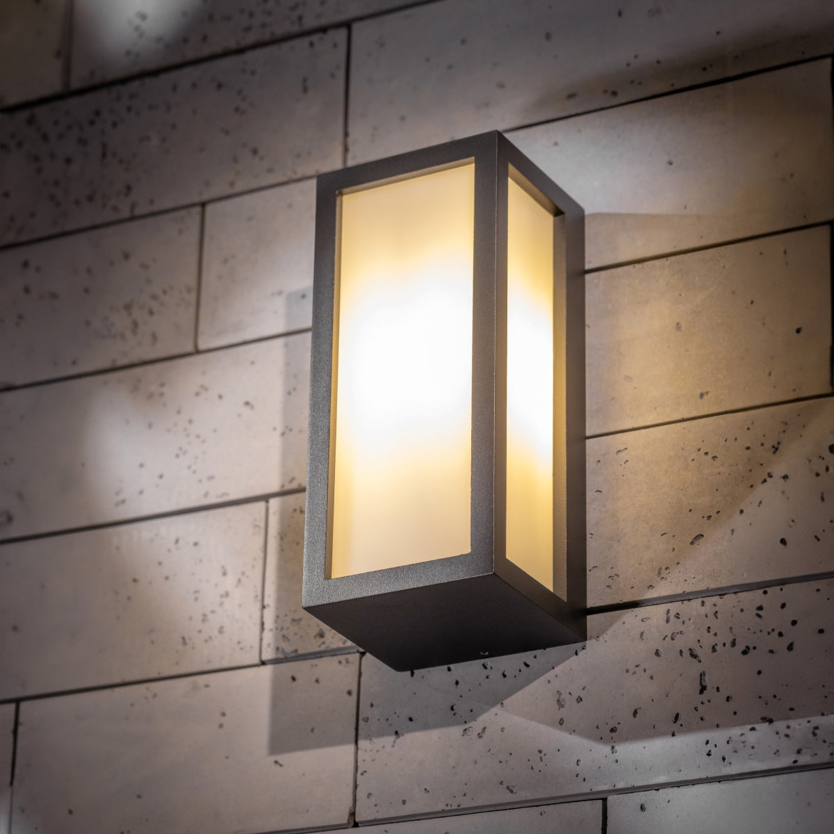 If you’re looking for a modern take on a traditional outdoor wall light, this black aluminium rectangle wall light is perfect for adding style and protection for your home. This classic design with a contemporary twist, styled with a metal rectangle shape and fitted with opal diffusers also contains an imposing black finish