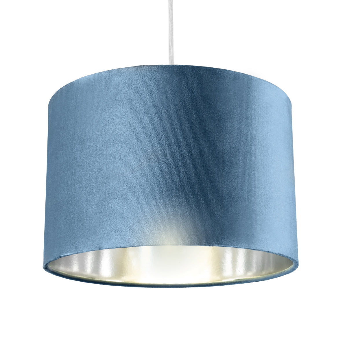 Our Nila velvet shade is sophisticated in appearance and we have designed the shade to suit a range of interiors. Easy to fit, it’s crafted from high-quality velvet on the outer and has a reflective silver metallic inner. It's made to fit both a ceiling light or lamp base.