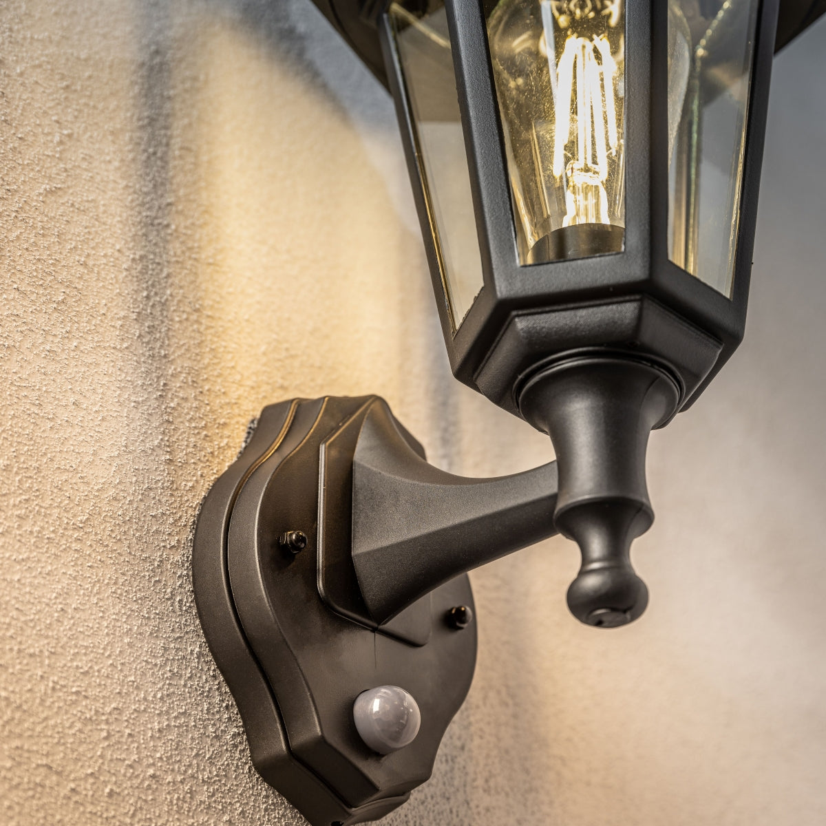 Our Yasmin lantern delivers on style and durability and is a smart choice for your exterior lighting. With its black polycarbonate construction teamed with clear polycarbonate panes and built in motion sensor, this lantern is hardwearing and rust and weatherproof. Built for life outdoors, it has an IP44 rating which means it can withstand the harshest of weather conditions.