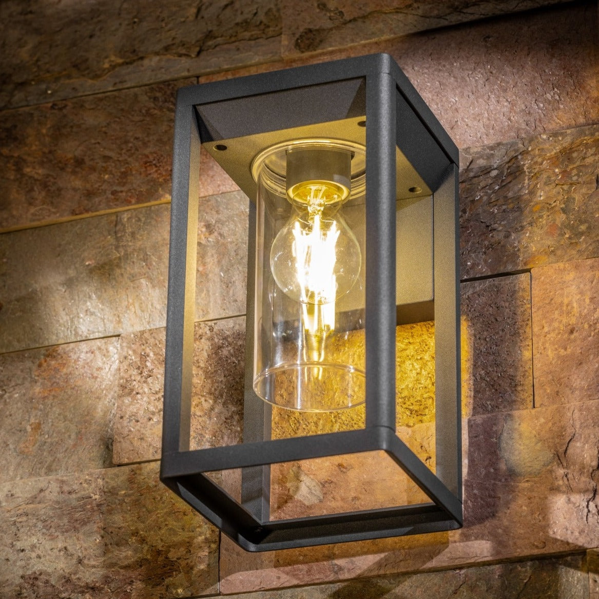 If you’re looking for a modern take on a traditional outdoor wall light, this modern anthracite lantern light with clear diffuser wall light is perfect for adding style and protection for your home. This classic wall light is designed with a contemporary twist, styled with a rectangle shape and fitted with clear diffuser that allow the light to shine effectively.