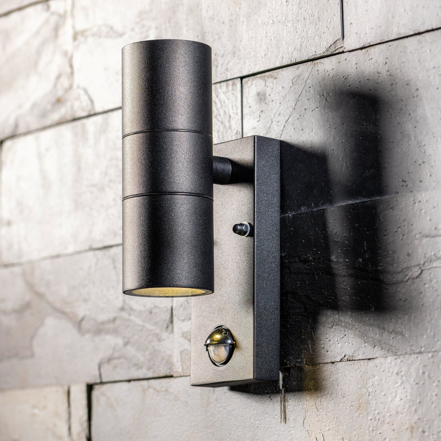 Our Leon outdoor single down light is modern and stylish in its appearance. It comes in a cylinder design mounted on a rectangle back plate complete with clear glass diffuser and built in PIR motion sensor. It is designed for durability and longevity with its robust material producing a fully weatherproof and water resistant light fitting