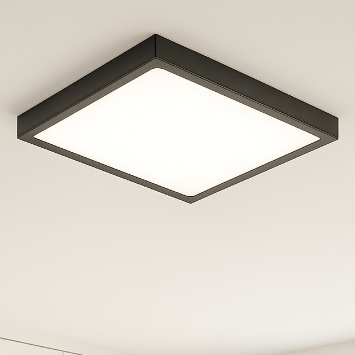 Square ceiling light fixture on a neutral background