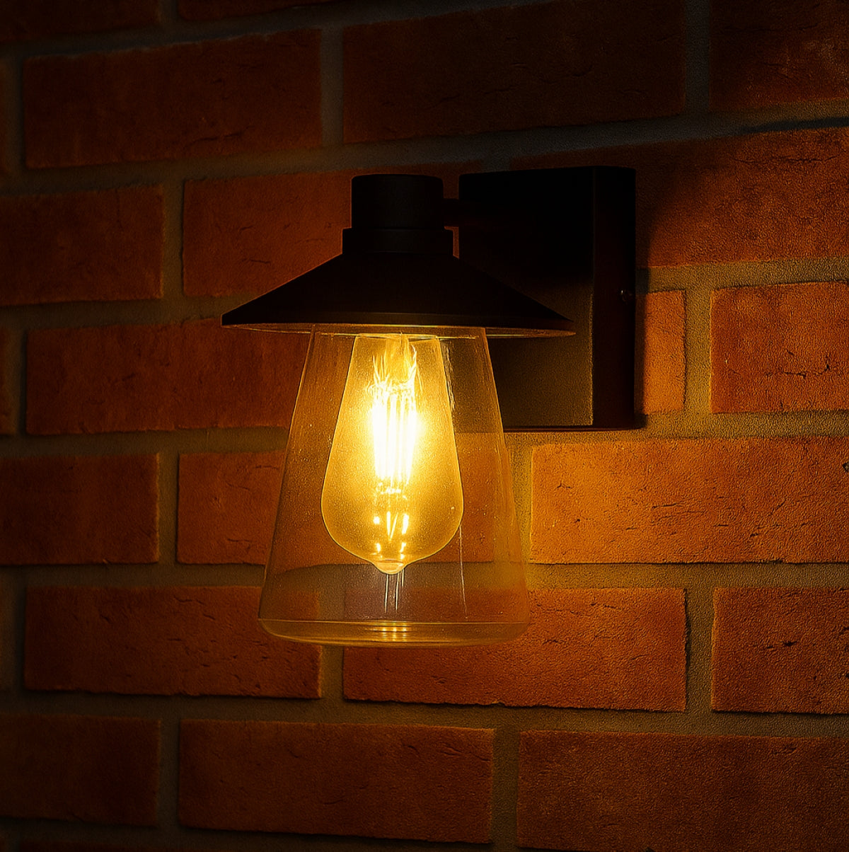 Wall-mounted light fixture with a glowing bulb on a brick wall