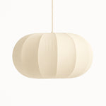Beige pendant lamp with a textured design on a white background