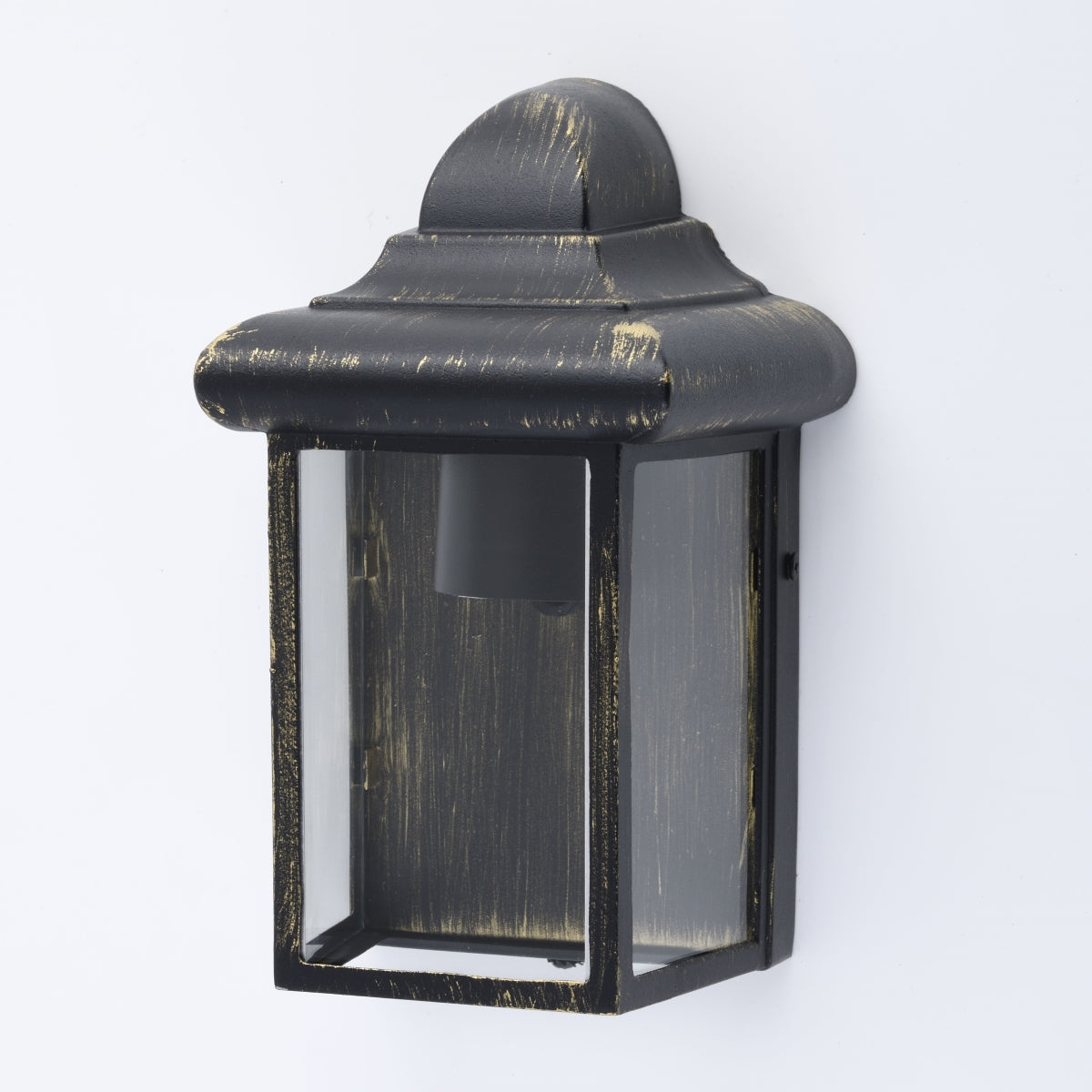 Our Camila wall lantern light is styled with a sophisticated black and bronze colour scheme, allowing the wall light to fit into any home’s style. What’s more, the lantern’s design is a modern take on a traditional styled wall light, creating a flexible look for interior and exterior use. 