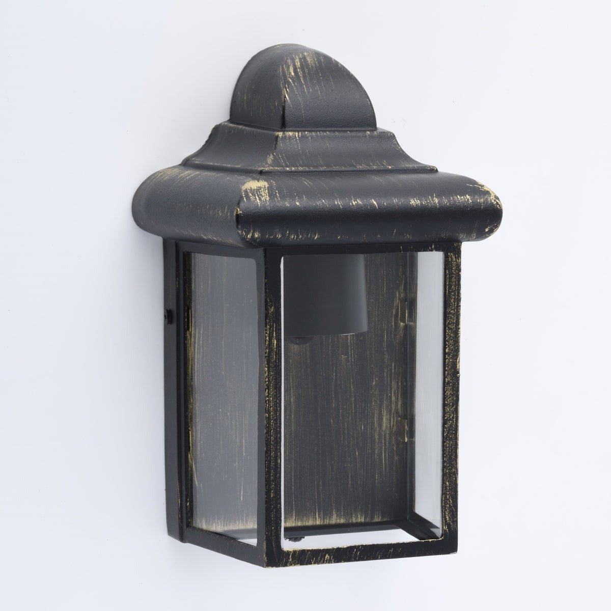 Our Camila wall lantern light is styled with a sophisticated black and bronze colour scheme, allowing the wall light to fit into any home’s style. What’s more, the lantern’s design is a modern take on a traditional styled wall light, creating a flexible look for interior and exterior use. 
