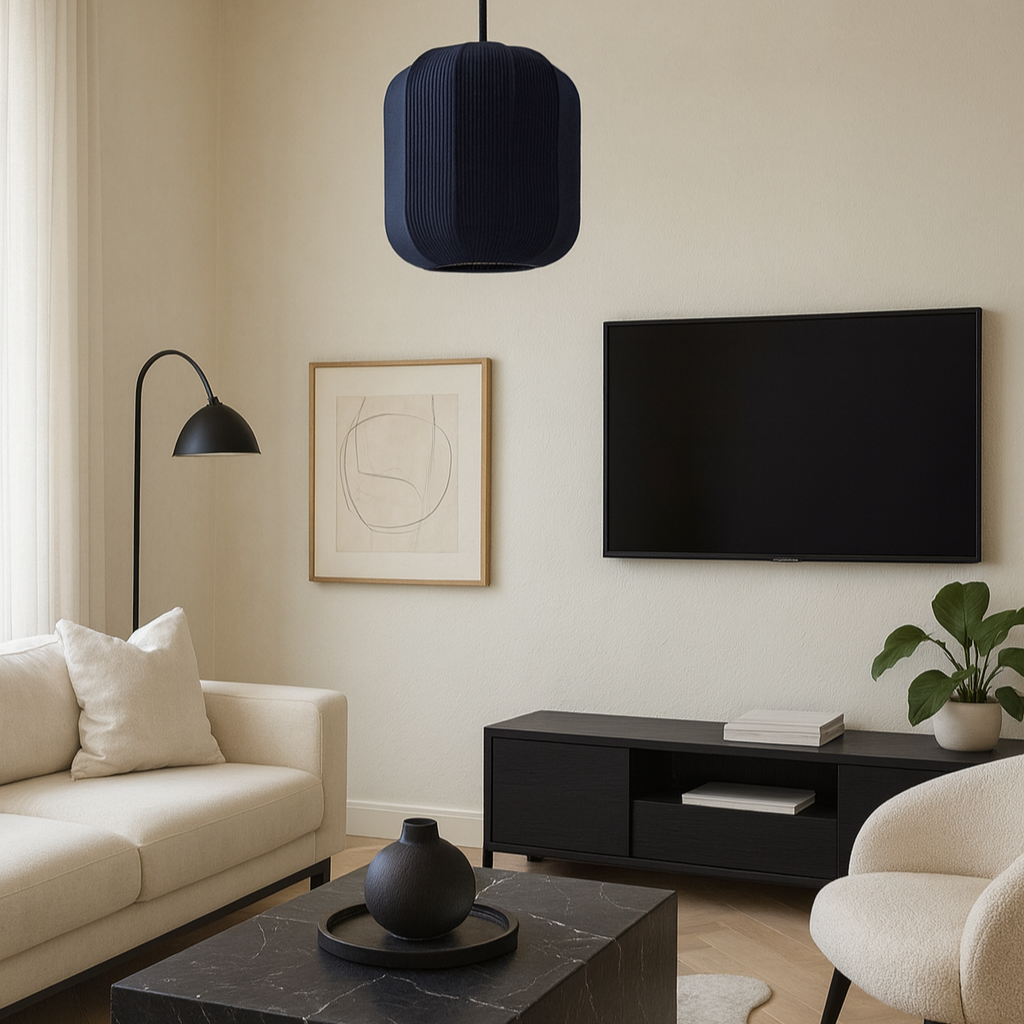 Modern living room with a black marble coffee table, white sofa, and TV stand.