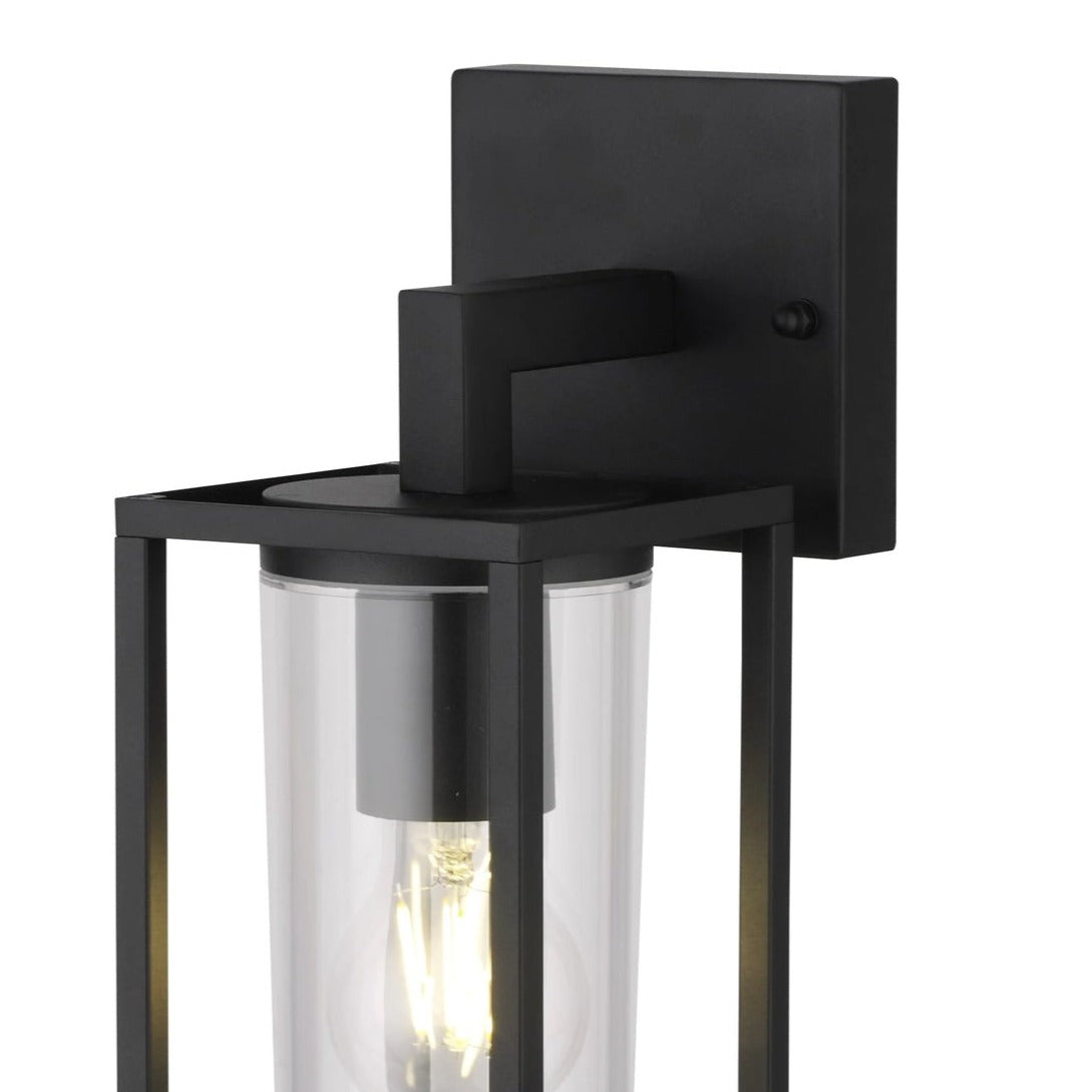 If you’re looking for a modern take on a traditional outdoor wall light, this black lantern wall light with clear diffuser is perfect for adding style and protection for your home. This classic design with a contemporary twist, styled with a metal lantern shape and fitted with a cylinder diffuser that allows the light to shine effectively. This product also contains an imposing black finish, making it ideal for any home design