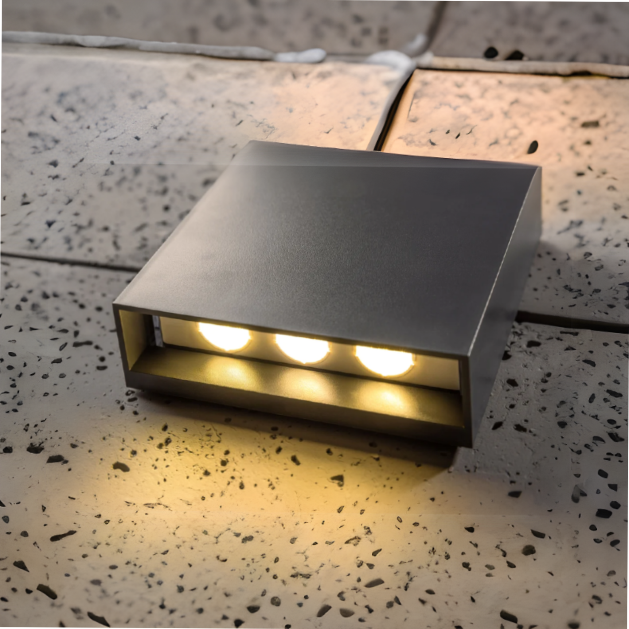 Our Sian dark grey anthracite outdoor wall mounted rectangle outdoor light would look perfect in a modern or more traditional home design. Outside wall lights can provide atmospheric light in your garden, at the front door or on the terrace as well as a great security solution. It is designed for durability and longevity with its robust material producing a fully weatherproof and water resistant light fitting making it suitable for coastal areas.