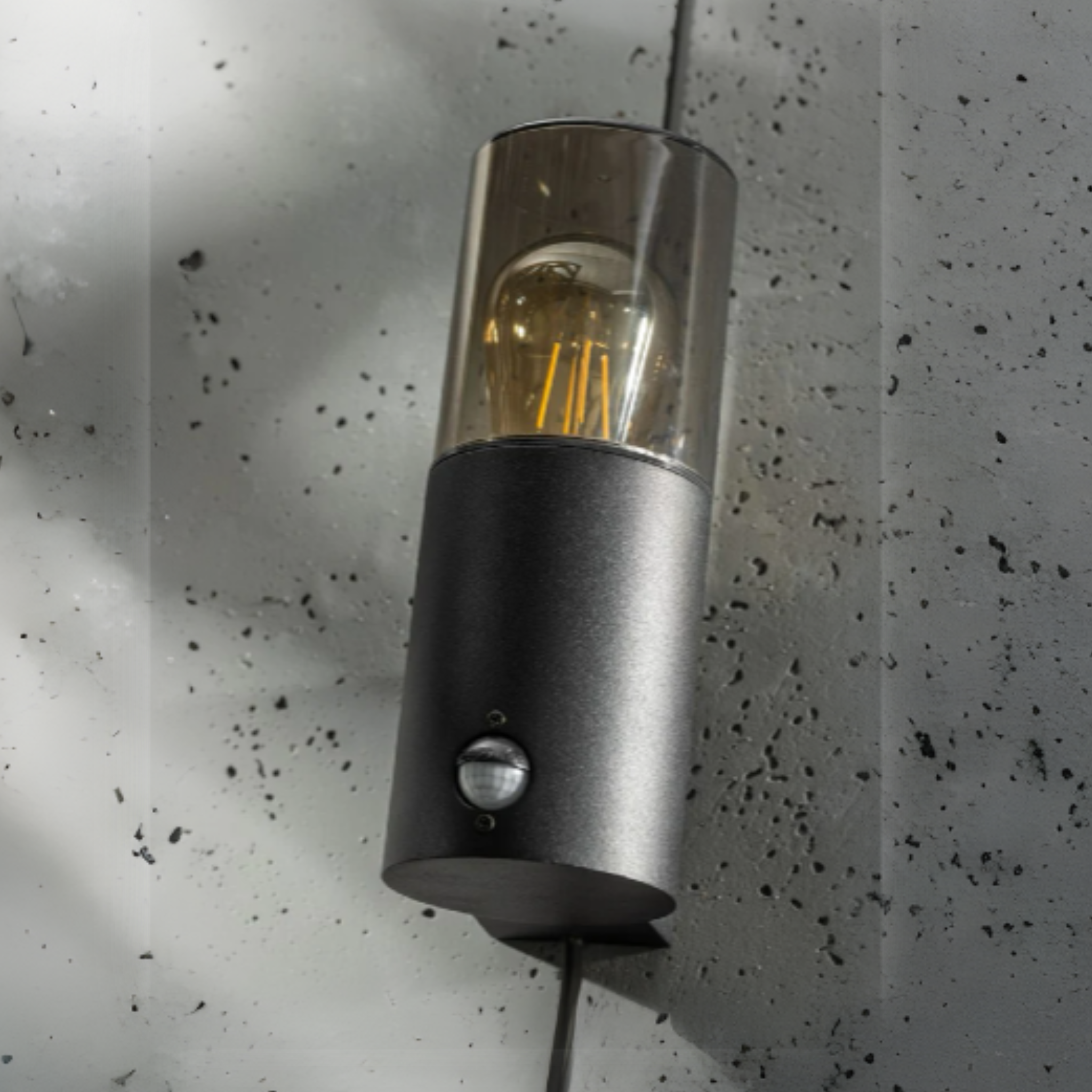 Explore our black cylinder wall light today, fit with a smoky diffuser and motion sensor features! If you require a valuable lighting system and an additional layer of security for your home’s outdoor space, then this lighting body can provide the right protection and style for you.