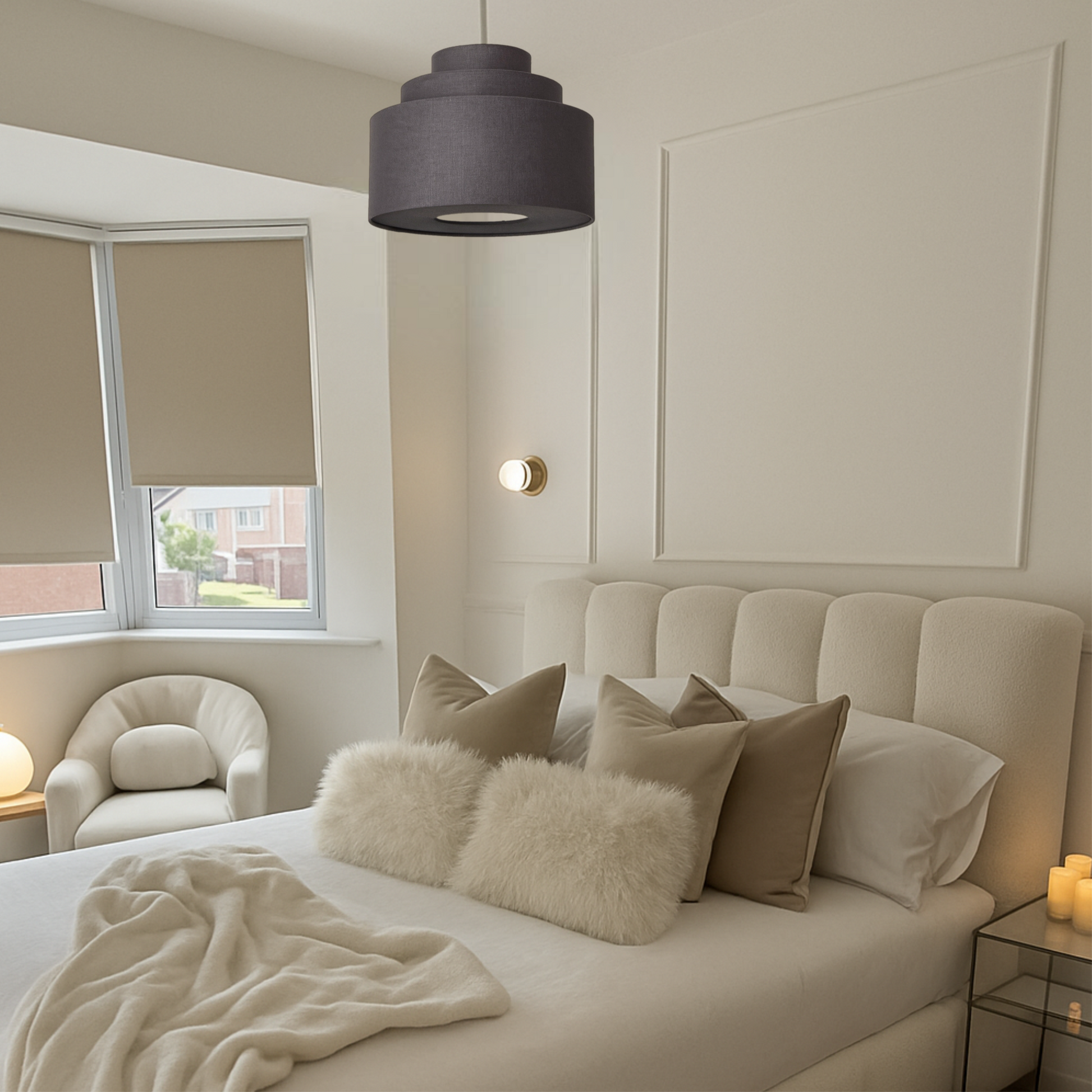 Modern bedroom with a bed, armchair, and window