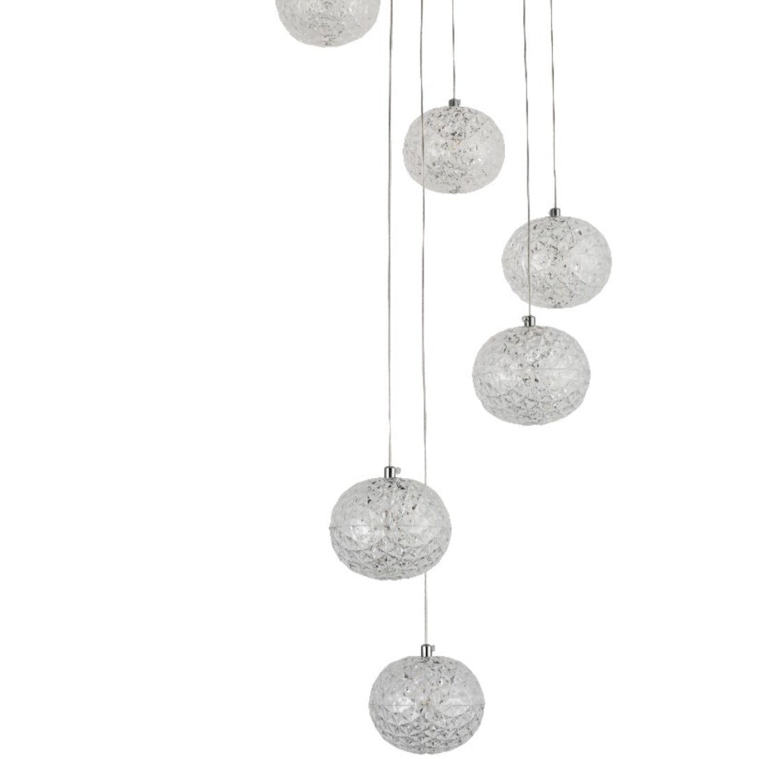 Our striking 7 Ball LED pendant light in chrome with height adjustable clear acrylic globes is the perfect way to make a statement with your interiors. It is inspired by elements of the night sky, comprising of a delicately crafted clear acrylic crystal globes in round spherical shape and perfectly finished in low energy built in LED lights.