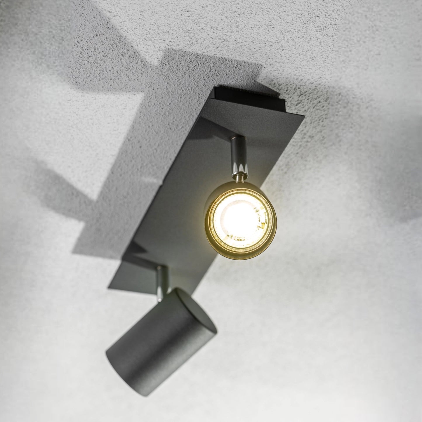 Add an industrial style to your home with the VENETO spotlight light finished in white. The lamp is also ideal for task lighting due to the adjustable heads providing a focused beam. The simplistic design of this light fitting makes it suitable for all interior styles.