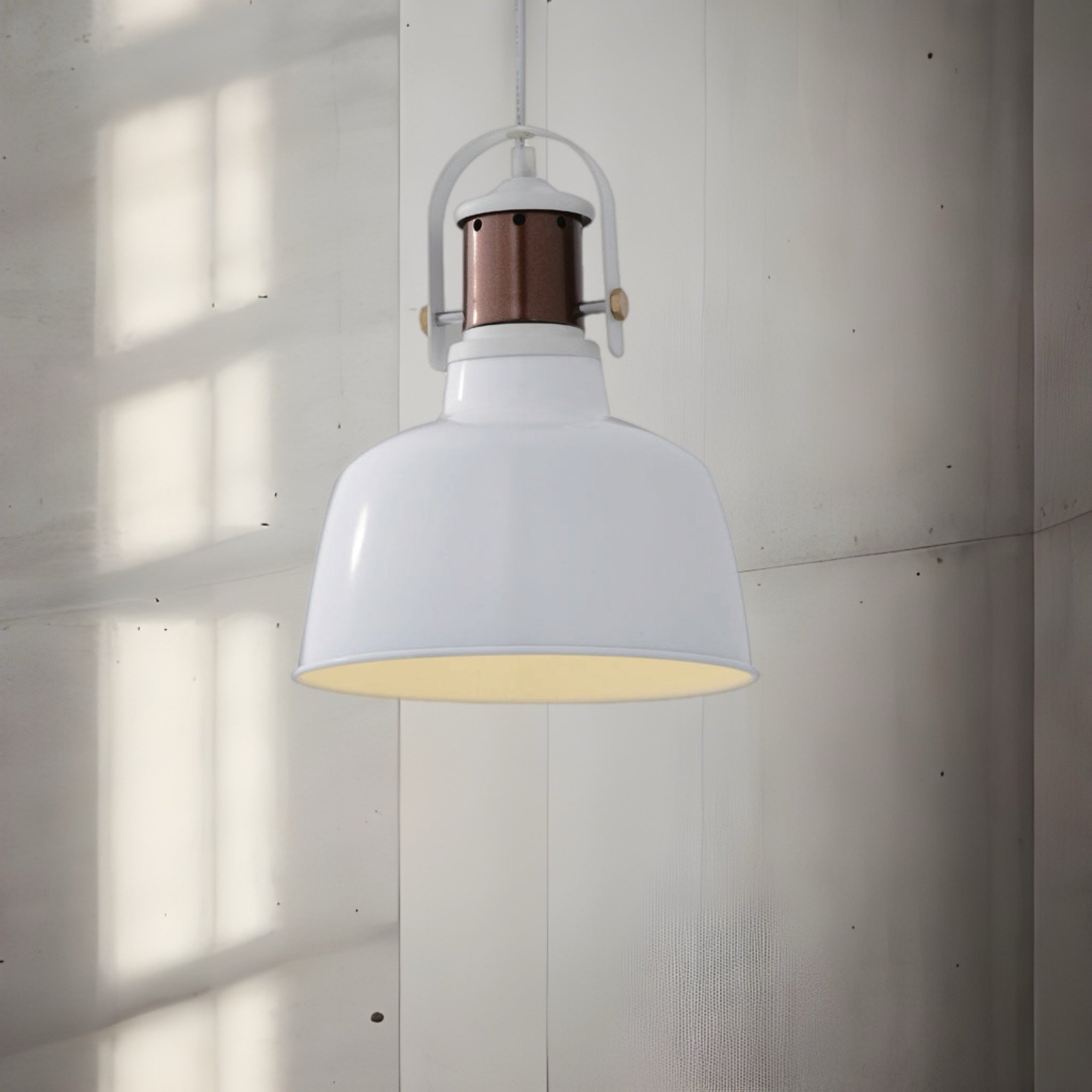 Our Marnie white adjustable dome ceiling pendant light is the perfect addition to any room to add a modern and industrial focal point. The industrial style of this light brings a bright and elegant aesthetic to your interior as the dome shape creates a modern and contemporary appearance.