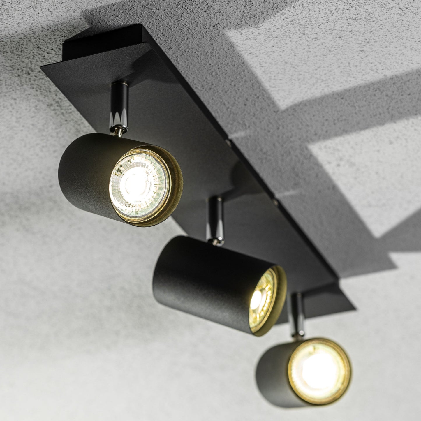 Add an industrial style to your home with the VENETO spotlight light finished in white. The lamp is also ideal for task lighting due to the adjustable heads providing a focused beam. The simplistic design of this light fitting makes it suitable for all interior styles.