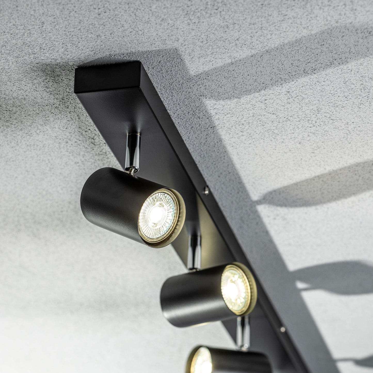 Add an industrial style to your home with the VENETO spotlight light finished in white. The lamp is also ideal for task lighting due to the adjustable heads providing a focused beam. The simplistic design of this light fitting makes it suitable for all interior styles.