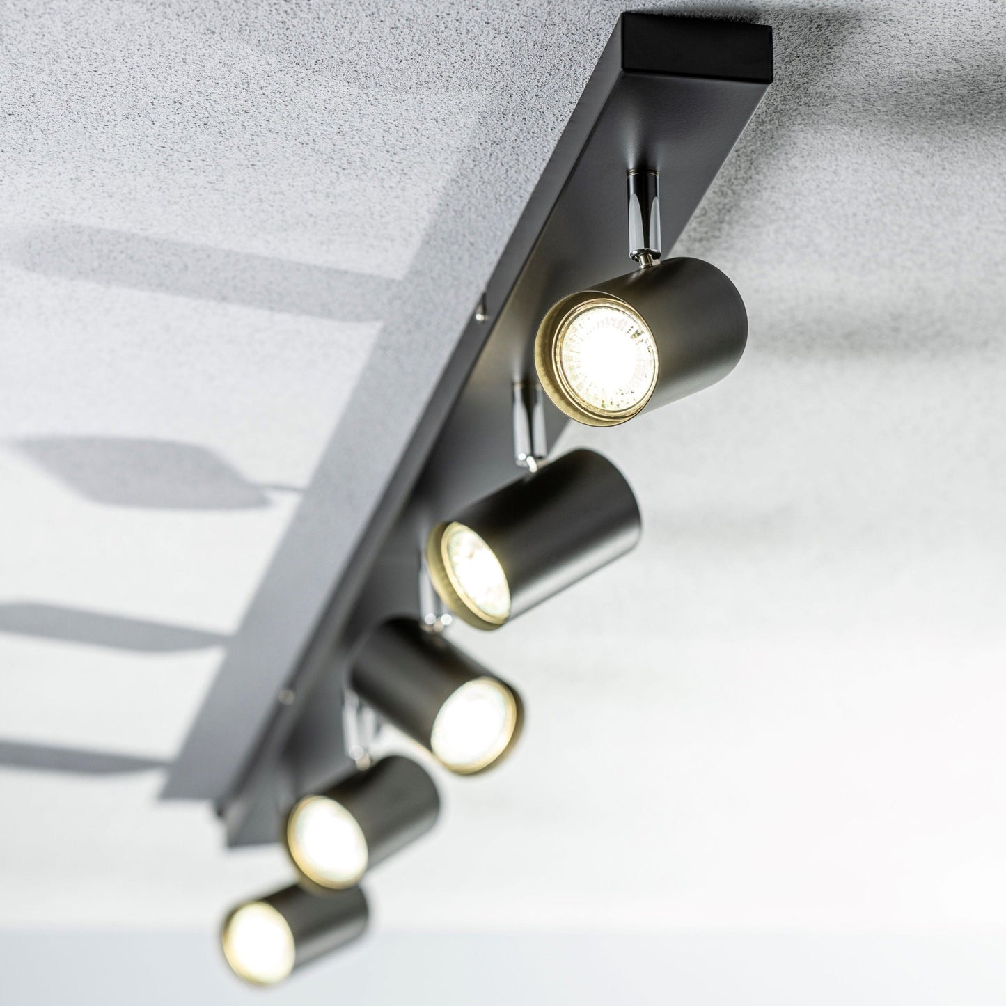 Add an industrial style to your home with the VENETO spotlight light finished in white. The lamp is also ideal for task lighting due to the adjustable heads providing a focused beam. The simplistic design of this light fitting makes it suitable for all interior styles.