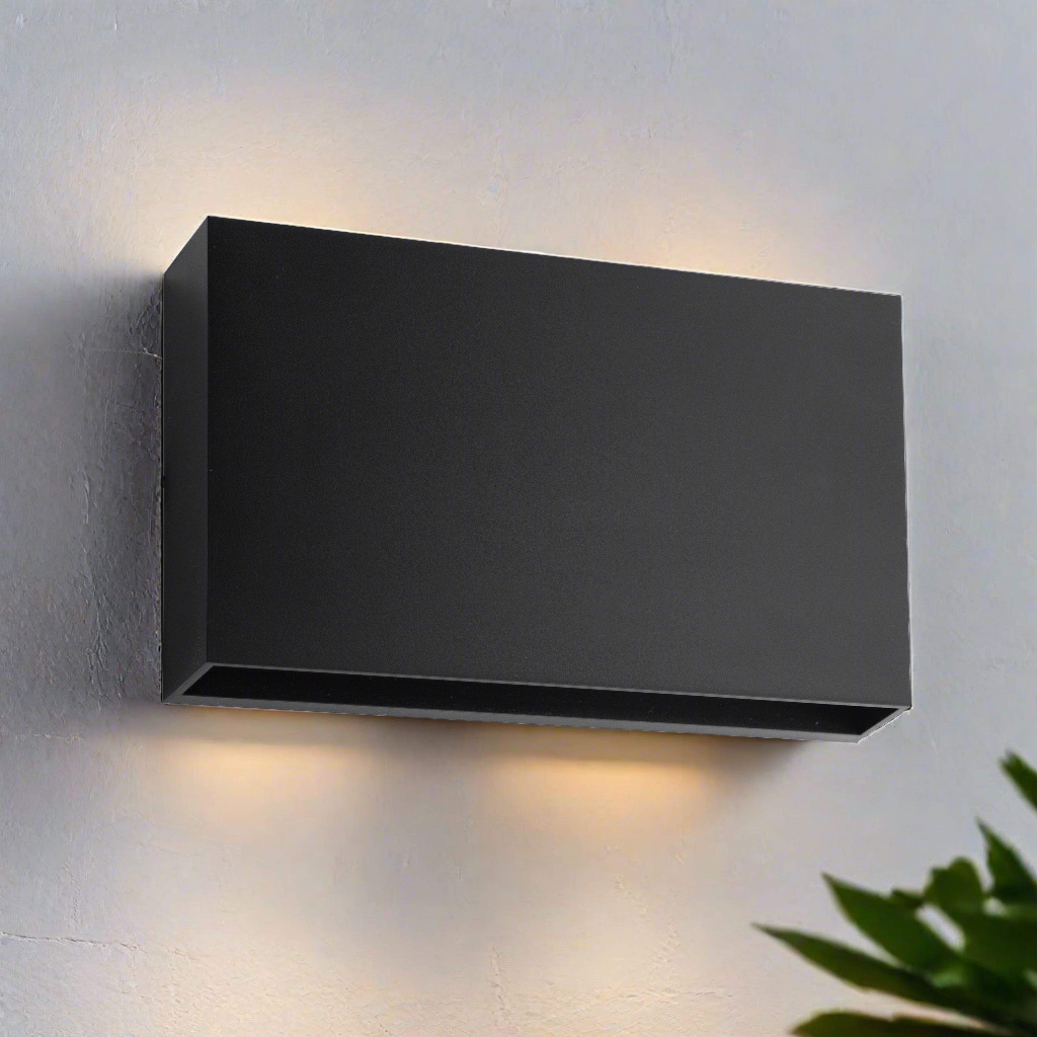 Our Donna dark black slim up & down LED wall light outdoor light would look perfect in a modern or more traditional home design. Outside wall lights can provide atmospheric light in your garden, at the front door or on the terrace as well as a great security solution. It is designed for durability and longevity with its robust material producing a fully weatherproof and water resistant light fitting making it suitable for coastal areas.