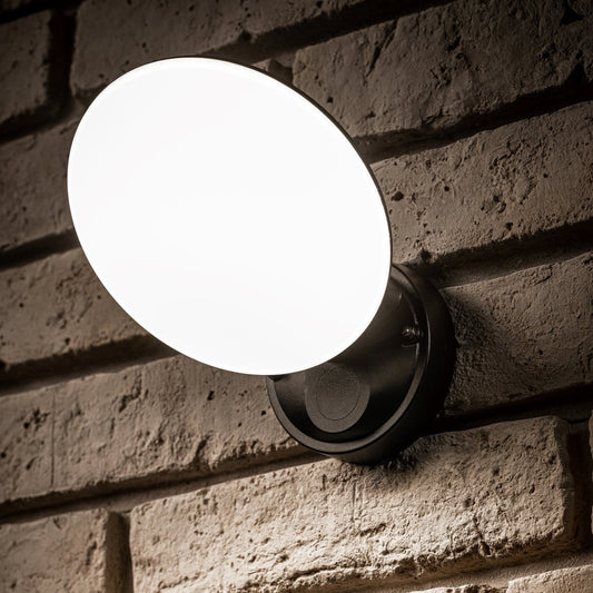Our EZRA black plastic ABS plastic outdoor wall mounted round outdoor light with built in LED's would look perfect in a modern or more traditional home design. It is designed for durability and longevity with its robust material producing a fully weatherproof and water resistant light fitting.
