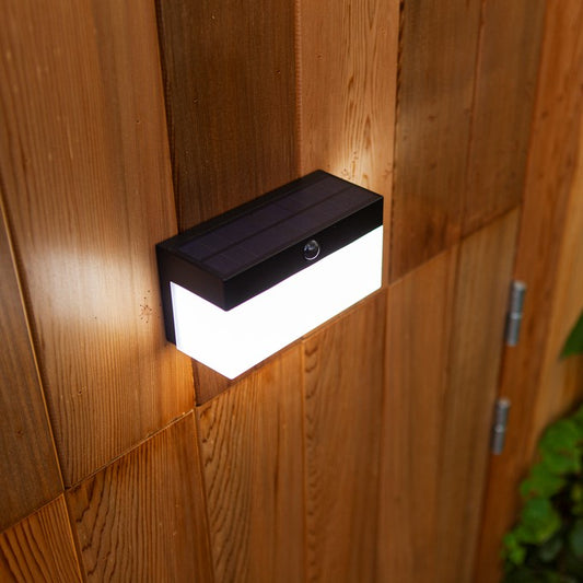 Our Soleil LED outdoor wall light is a cordless solar wall light in a modern and minimalist design. It is charged by sunlight during the day and turns on automatically when detecting motion. The light is perfect for illuminating your main entrance, driveway or other areas. Easy installation with no cables needed thanks to the connected module you can light your outdoor space completely to your personal taste via the free app.