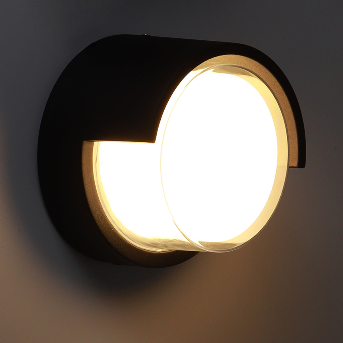 Sophia black and white round wall light is an modern simple fitting with a black polycarbonate body and opal diffuser. This stylish wall light is perfect for adding a pinch of modern flavour to doorways, sheds, patios, porch, driveways, garages, sheds, and more. This fitting is IP65 rated which makes it fully weatherproof light fitting.