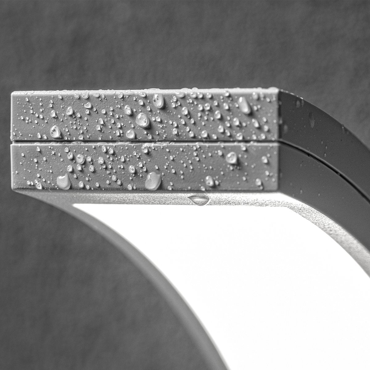 Paris has been designed for use outdoors. It features IP code IP54, which means that the light is protected from dirt and moisture. This LED outdoor wall light is simple and modern in design to create a minimalist light. The LEDs are housed behind an opal white panel made of polycarbonate.