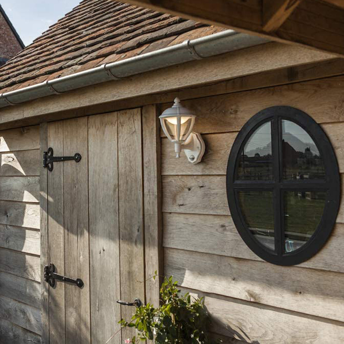 Our Cindy lantern wall light delivers on style and durability and is a smart choice for your exterior lighting. With its white aluminium construction teamed with clear panes, this lantern is hardwearing and rust and weatherproof. Built for life outdoors, it has an IP44 rating which means it can withstand the harshest of weather conditions. For sophisticated yet robust outdoor lighting, our Cindy white outdoor traditional lantern is a strong contender.