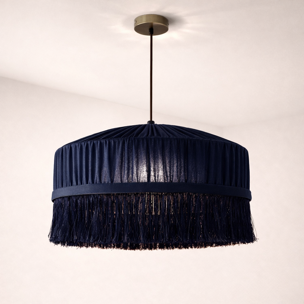 Navy blue pendant lamp with fringes on a white background