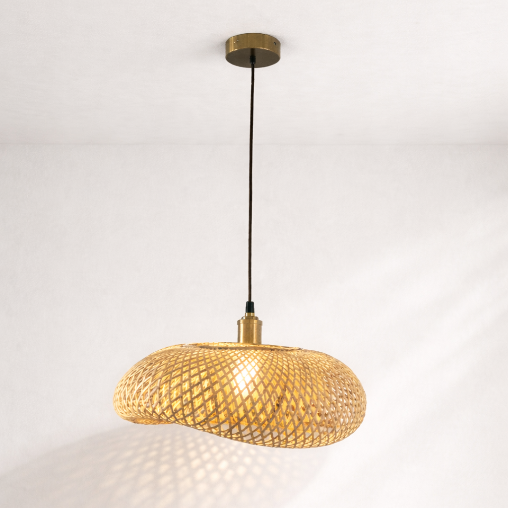 Gold pendant light fixture on a white background