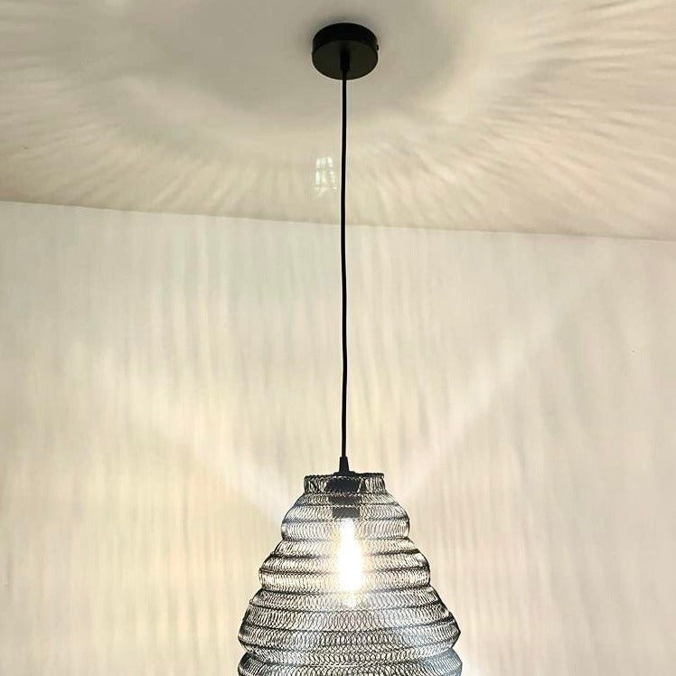 Bring a Moroccan twist to your home décor with the delicately crafted Casablanca ceiling light. Made in an intricate design from black metal wire this large statement light would look fabulous in both living and dining spaces, as well as bedrooms. When switched on the light shines through the shade creating a spectacular pattern on the ceiling and walls.