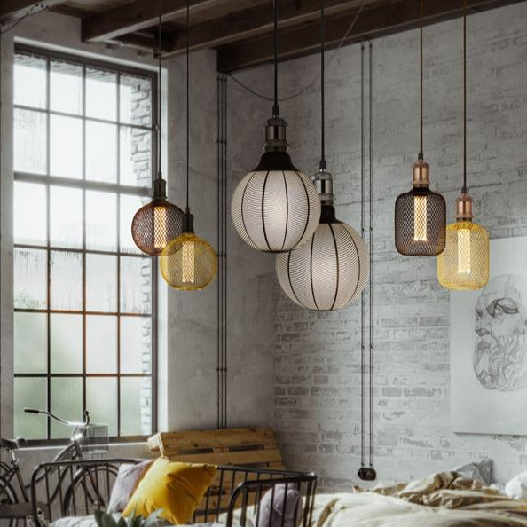 Our decorative gold mesh E27 LED drum bulb provides a unique aesthetic, blending seamlessly into many decors. Made from gold wire mesh in drum cross hatch pattern giving this bulb a real industrial feel. This energy-saving bulb is perfect for exposed lighting designs fits any standard E27 lamp holder.