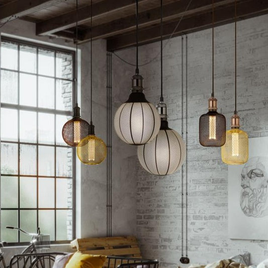 Our decorative gold mesh E27 LED globe bulb provides a unique aesthetic, blending seamlessly into many decors. Made from gold wire mesh in round cross hatch pattern giving this bulb a real industrial feel. This energy-saving bulb is perfect for exposed lighting designs fits any standard E27 lamp holder.