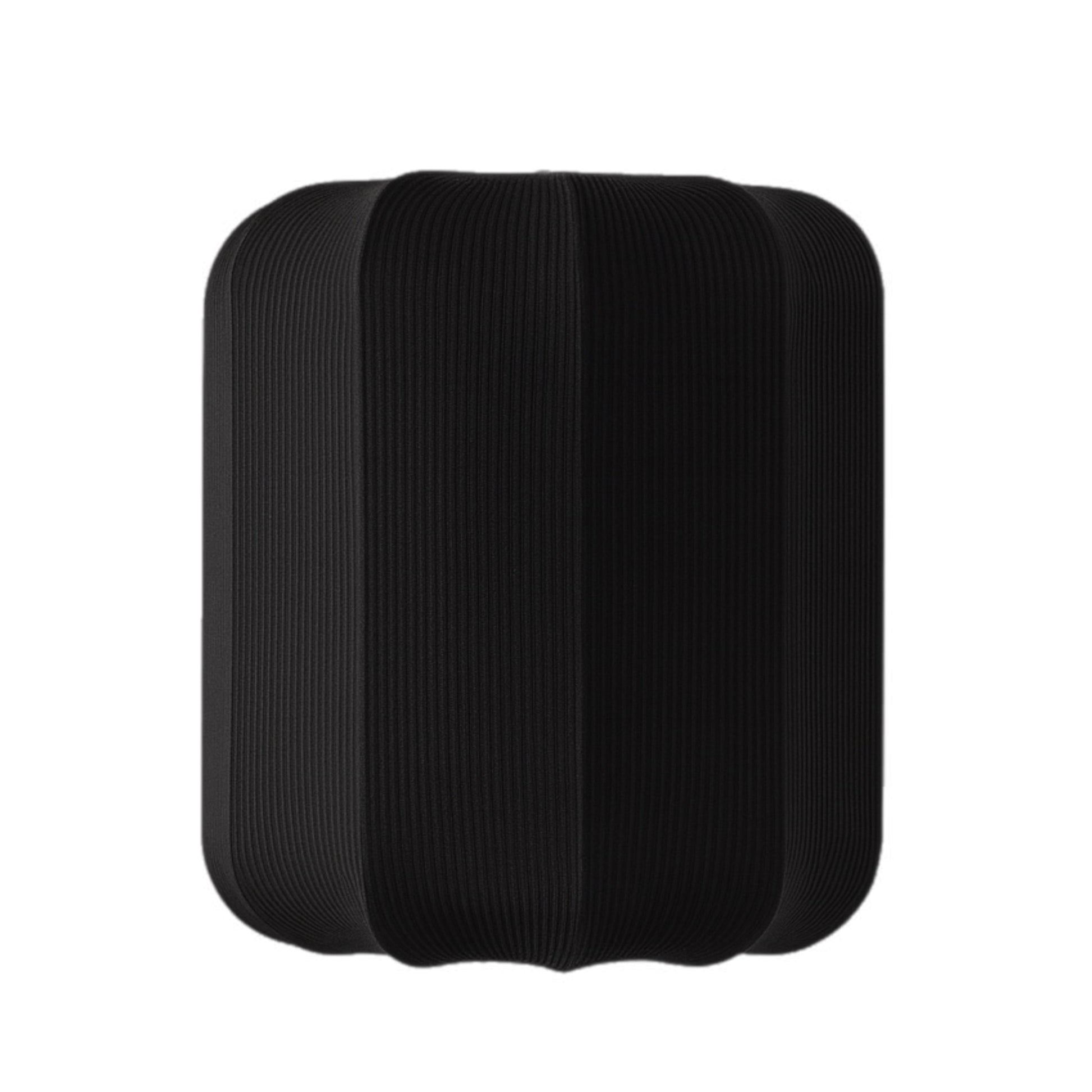 Black rectangular cushion with ribbed texture on a white background
