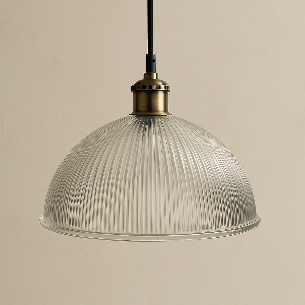 Pendant light with ribbed glass shade and brass fitting on a beige background