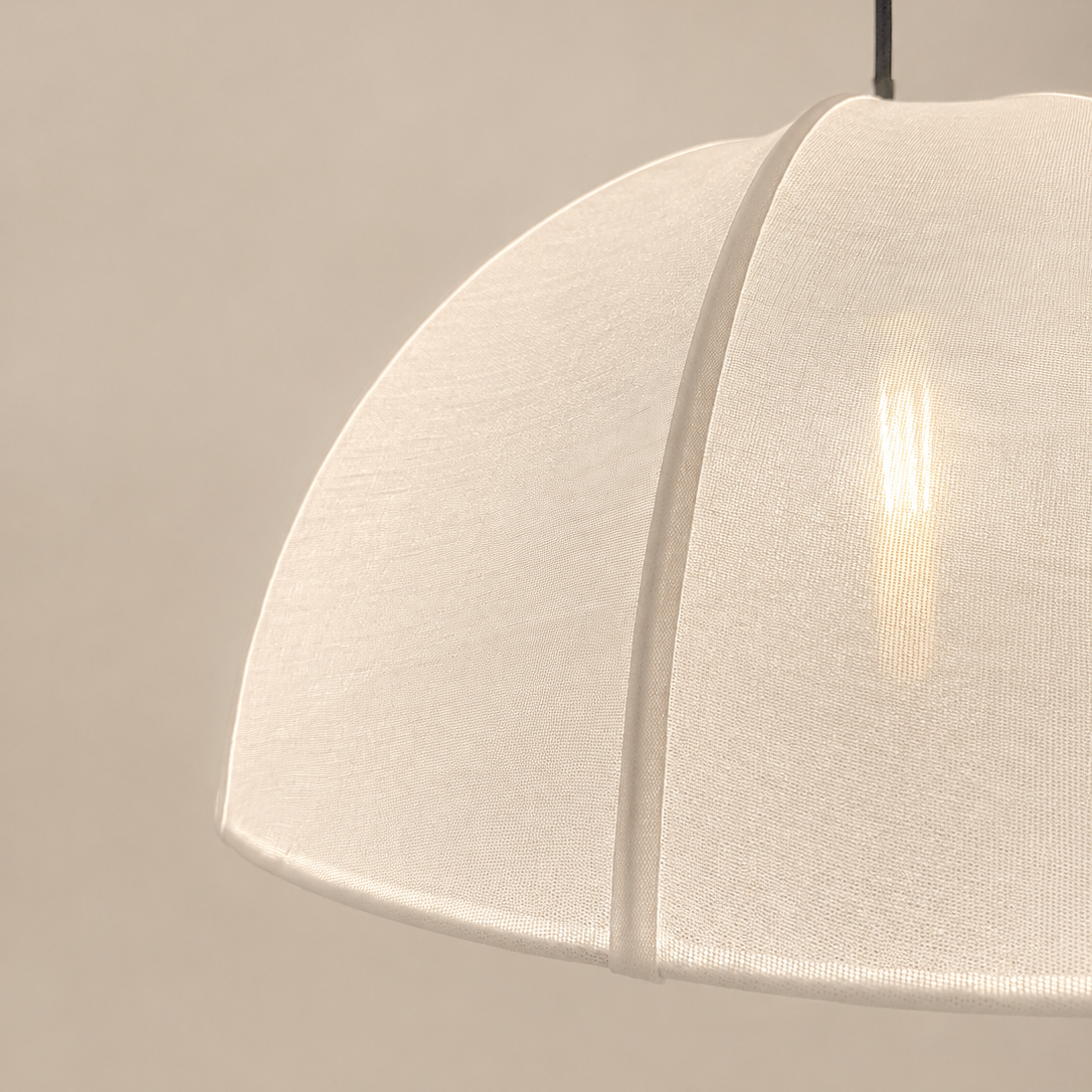 Close-up of a white pendant light with a beige background