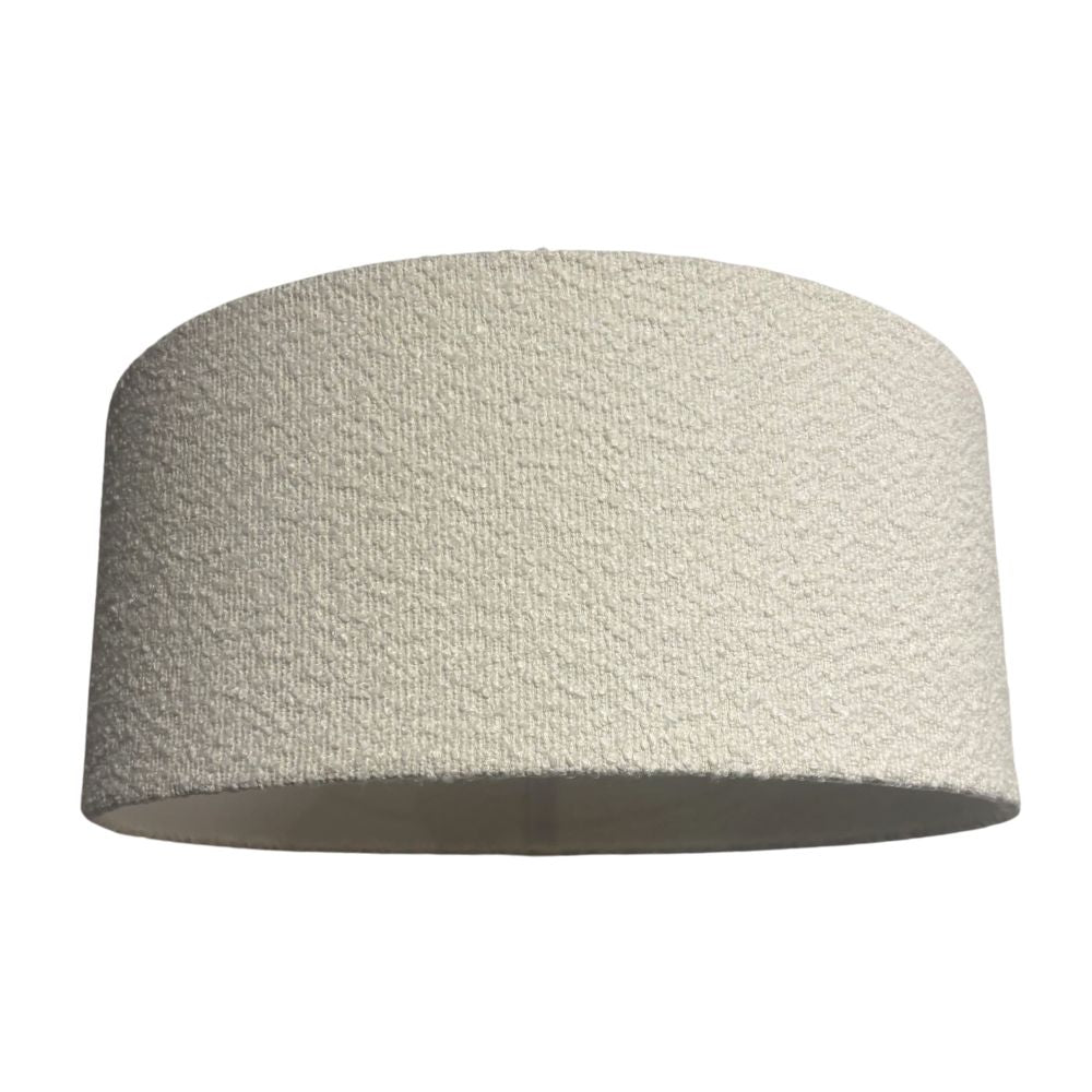 Textured beige lampshade on a white background