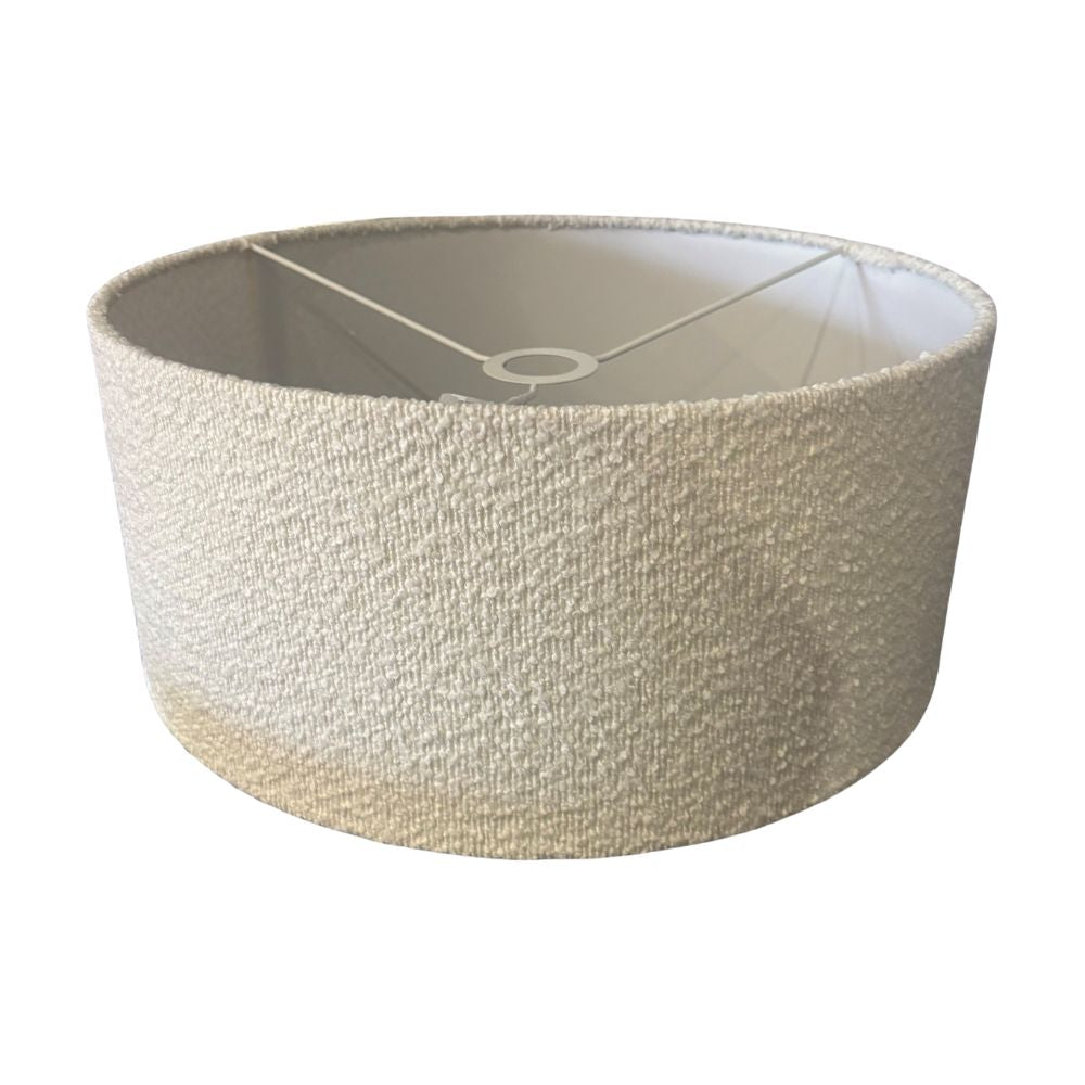 Textured beige lampshade on a white background