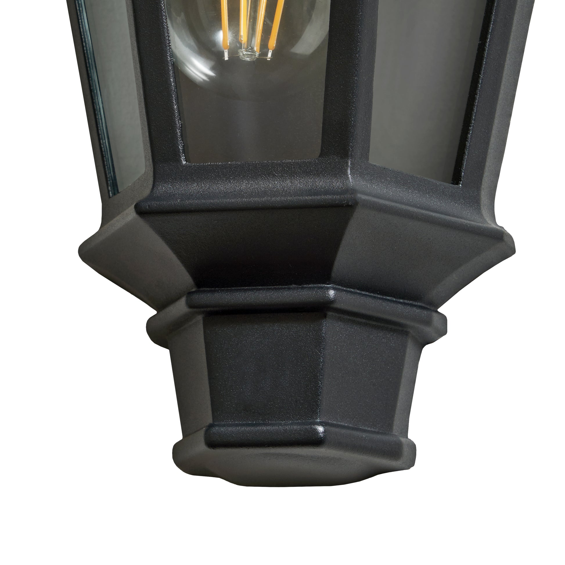 Black outdoor wall light fixture with a visible bulb on a white background