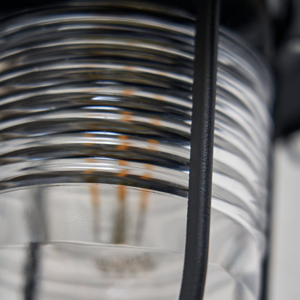 Close-up of a metal spring with blurred background