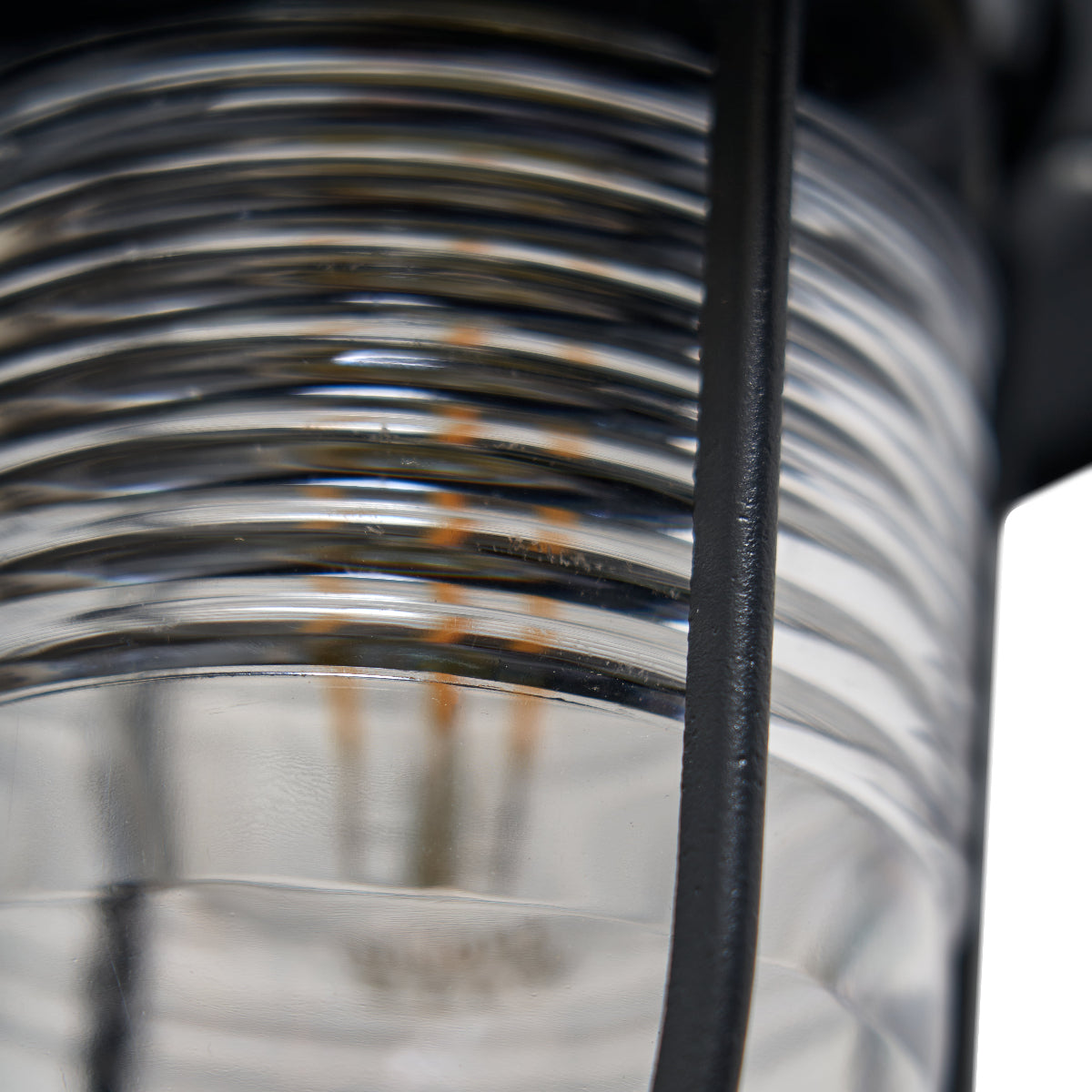 Close-up of a metal spring with a blurred background