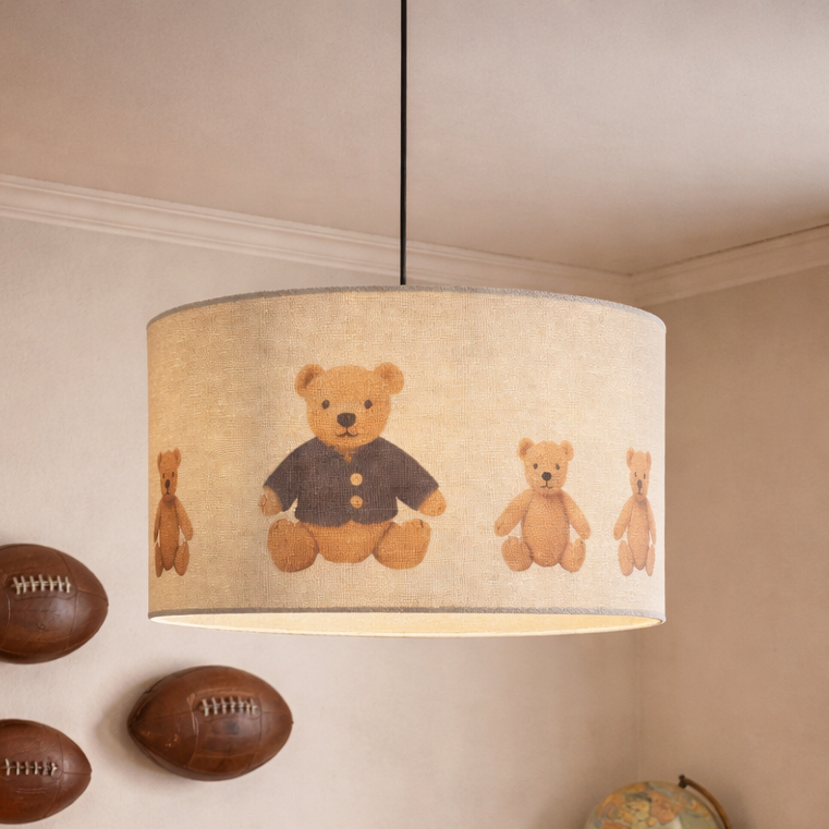 Children's bedroom with teddy bear-themed lamp, sports balls, and decorative items.