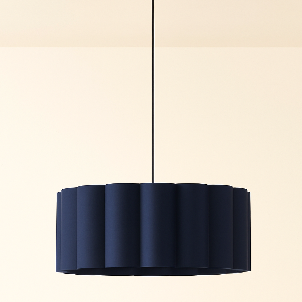 Navy blue pendant light with gold fixture on a beige background