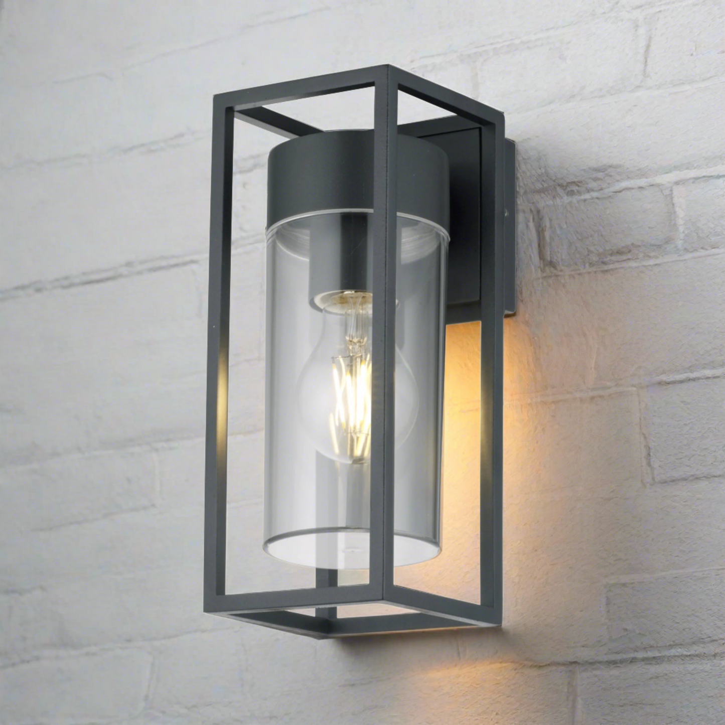 If you’re looking for a modern take on a traditional outdoor wall light, this anthracite wall light is perfect for adding style and protection for your home. This classic design with a contemporary twist, styled with a metal cuboid shape and fitted with a cylinder diffuser that allow the light to shine effectively. 