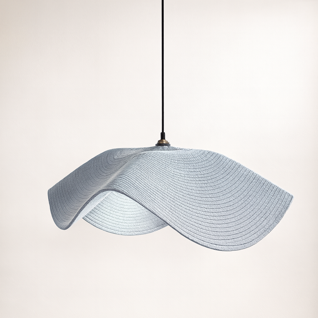Modern pendant light with wavy design on a plain background