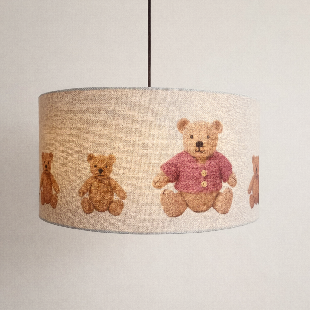 Lampshade with teddy bear pattern on a plain background