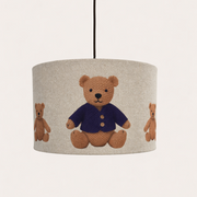 Lampshade with teddy bear design on a plain background
